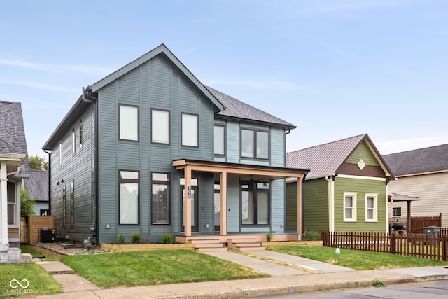 view of front facade featuring a front yard and a porch