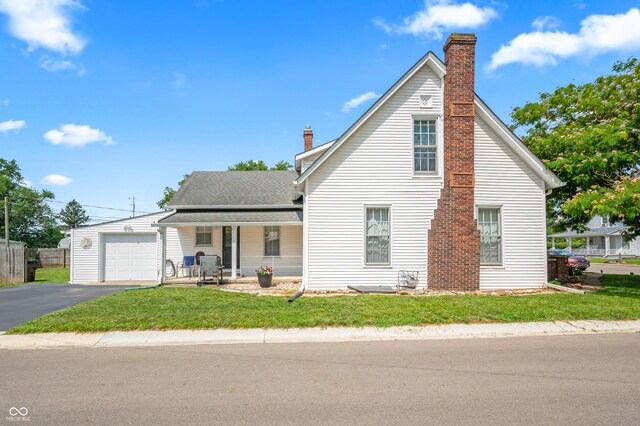 view of front facade with a front lawn and a garage