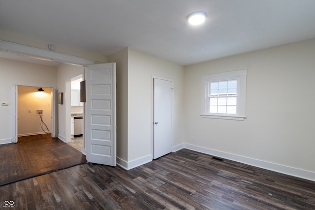 unfurnished bedroom with a closet and wood-type flooring