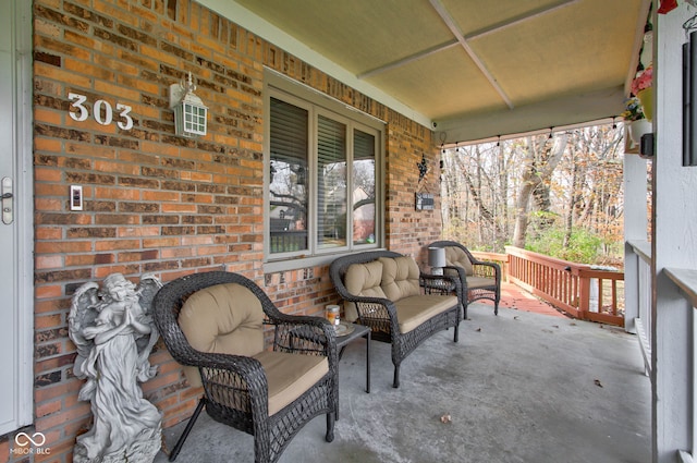 view of patio / terrace featuring an outdoor living space and a porch