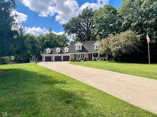 cape cod house with a garage and a front lawn