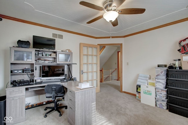 home office featuring ceiling fan, light colored carpet, and ornamental molding