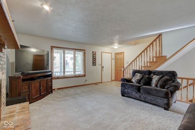 living room featuring a textured ceiling, light carpet, and a brick fireplace