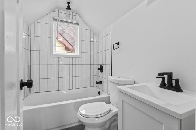 1046 Dawson St, Indianapolis, IN 46203 - full bath featuring toilet, vanity, shower / tub combination, and lofted ceiling