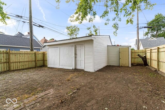 1046 Dawson St, Indianapolis, IN 46203 - view of shed featuring a fenced backyard