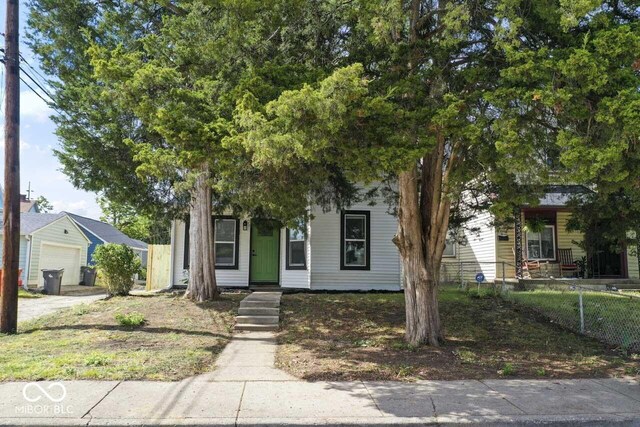 1046 Dawson St, Indianapolis, IN 46203 - view of property hidden behind natural elements featuring fence