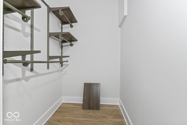 1046 Dawson St, Indianapolis, IN 46203 - walk in closet with wood finished floors