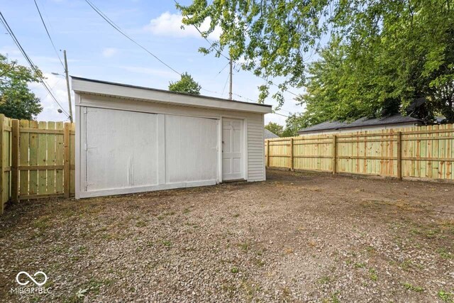 1046 Dawson St, Indianapolis, IN 46203 - garage with a shed and fence