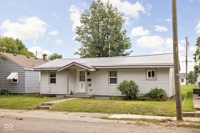 ranch-style house with a front lawn