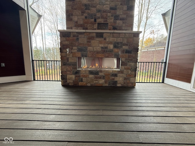 deck with exterior fireplace