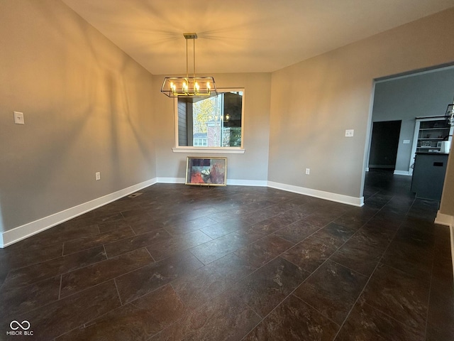 3380 N Pine Song Dr, Martinsville, IN 46151 - unfurnished dining area featuring a chandelier and dark stone finish flooring