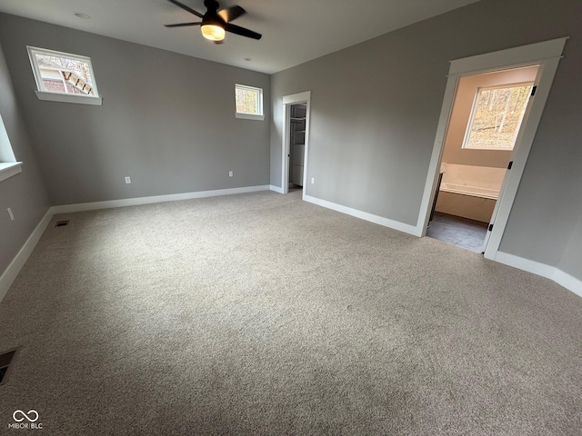 3380 N Pine Song Dr, Martinsville, IN 46151 - unfurnished bedroom featuring carpet flooring, baseboards, a walk in closet, and ensuite bathroom