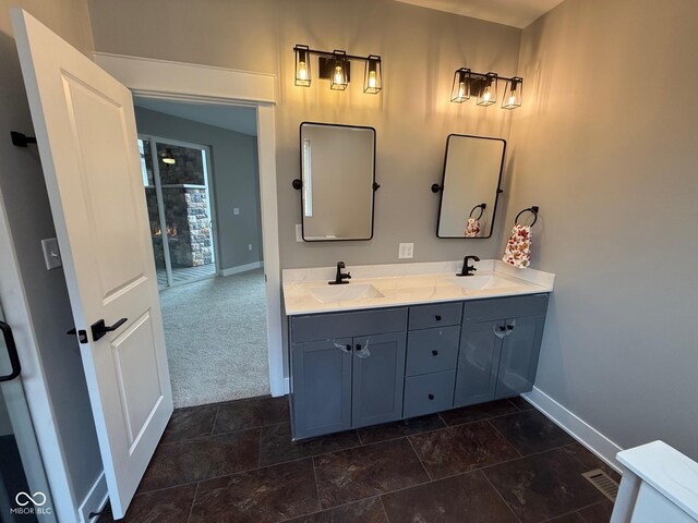 3380 N Pine Song Dr, Martinsville, IN 46151 - bathroom featuring baseboards and double vanity