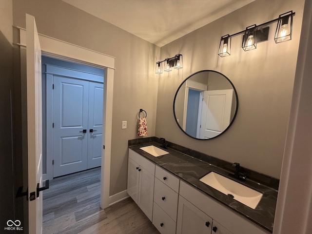 bathroom featuring vanity and hardwood / wood-style flooring