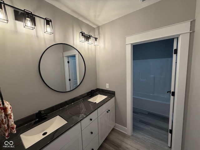3380 N Pine Song Dr, Martinsville, IN 46151 - full bath with wood finished floors, double vanity, and baseboards