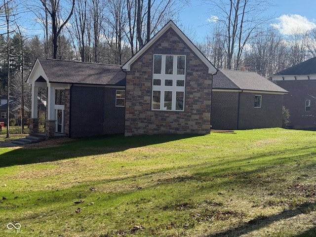 3380 N Pine Song Dr, Martinsville, IN 46151 - rear view of property featuring a lawn, stone siding, and roof with shingles