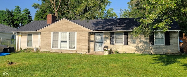 view of front of home with a front lawn