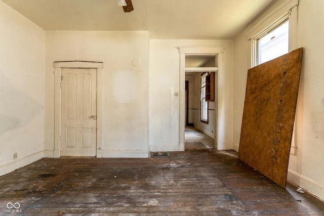 unfurnished room featuring wood-type flooring