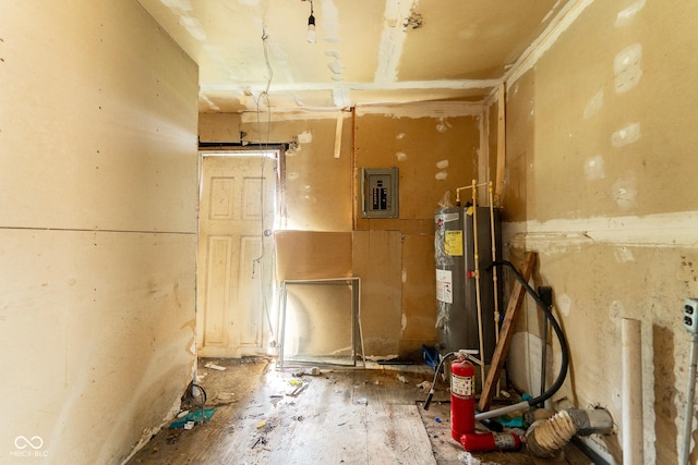 spare room featuring water heater and electric panel