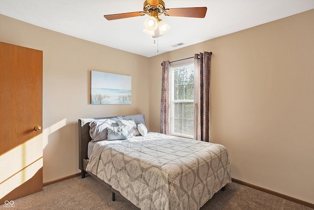 carpeted bedroom featuring ceiling fan