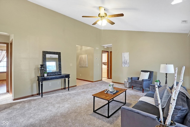 carpeted living room featuring a healthy amount of sunlight, ceiling fan, and vaulted ceiling