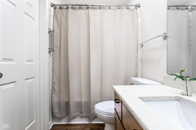 full bathroom featuring vanity, toilet, and shower / bath combo