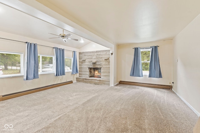 unfurnished living room featuring a baseboard radiator, lofted ceiling, a large fireplace, and carpet floors