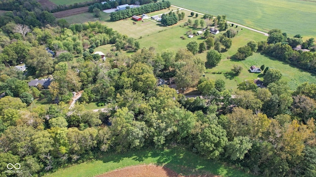 birds eye view of property featuring a rural view