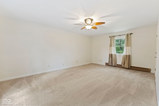 unfurnished room with ceiling fan and light colored carpet