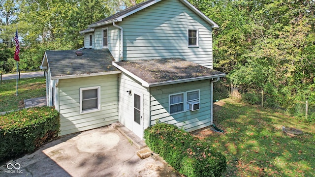 back of property featuring a patio