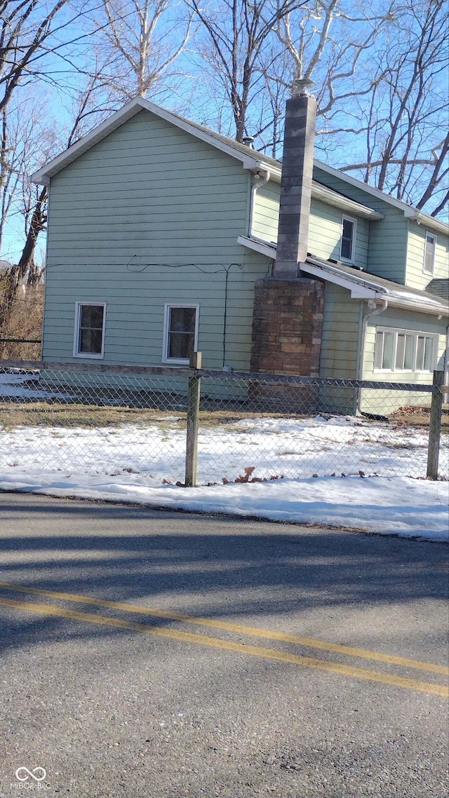 view of snow covered property