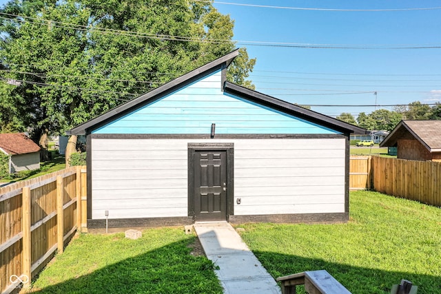 view of outbuilding featuring an outbuilding and a fenced backyard