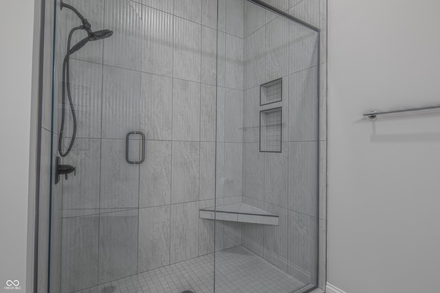 bathroom featuring walk in shower