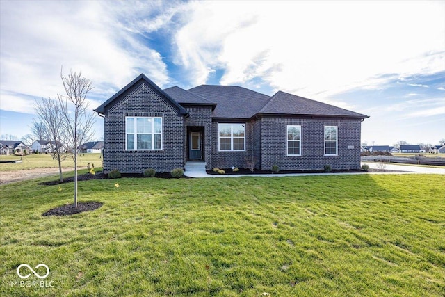 view of front of house with a front lawn