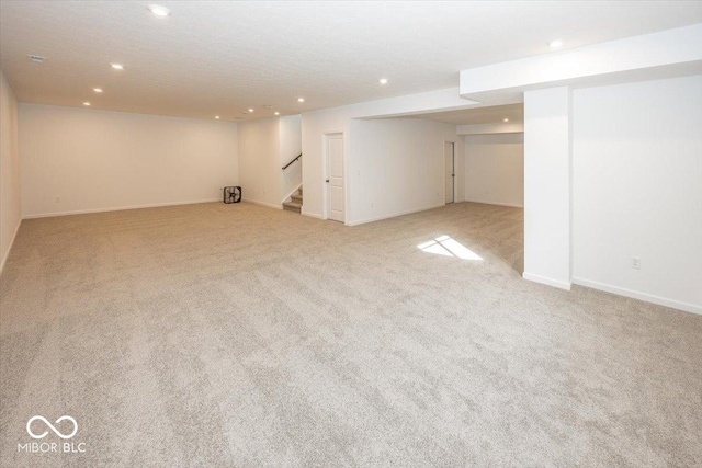 basement with light carpet