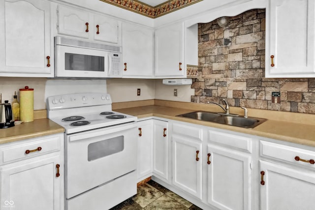 kitchen featuring white cabinets, a sink, backsplash, white appliances, and light countertops
