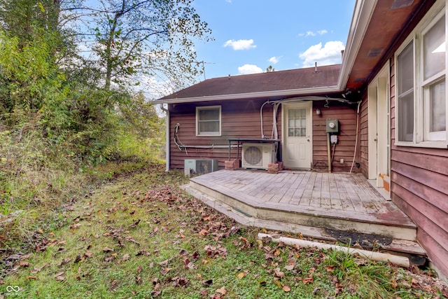 exterior space featuring ac unit and a deck