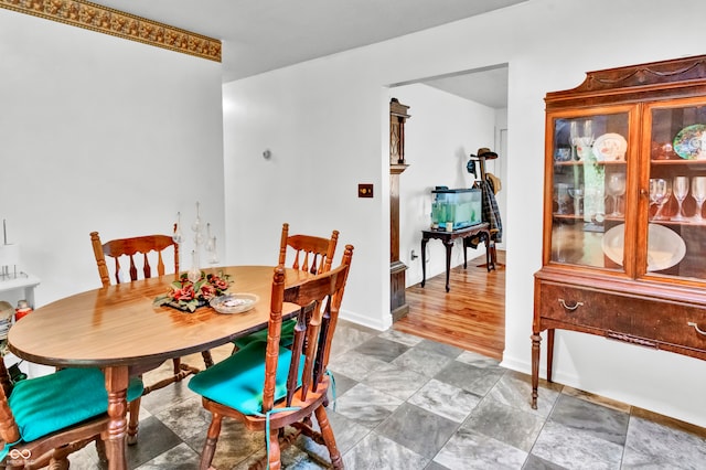 dining room with hardwood / wood-style flooring