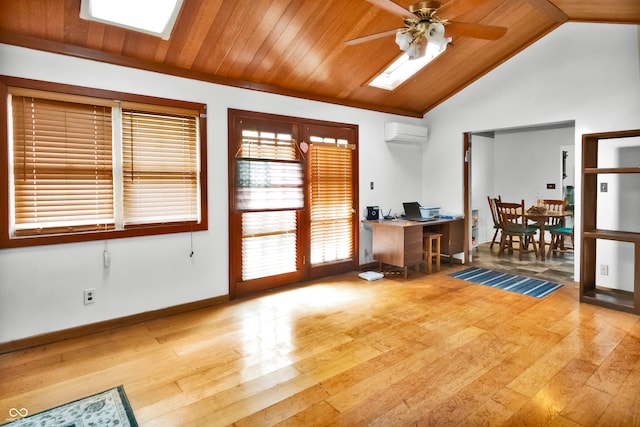 office space featuring an AC wall unit, ceiling fan, lofted ceiling, and light wood-type flooring