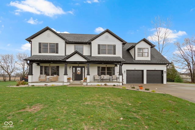 view of front of property featuring a front yard and a porch