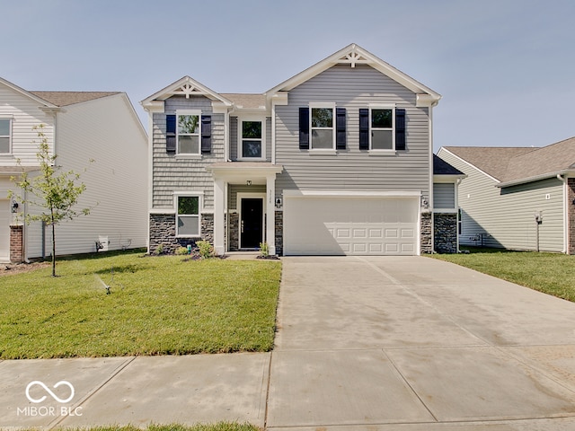 view of front of house with a front lawn and a garage