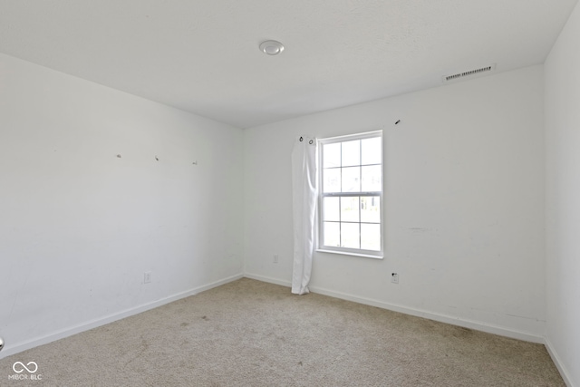 spare room with carpet flooring