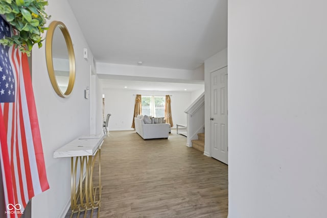 foyer entrance with hardwood / wood-style floors