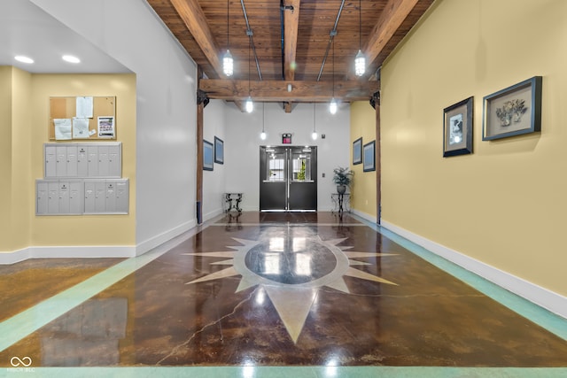 interior space featuring beam ceiling and wood ceiling