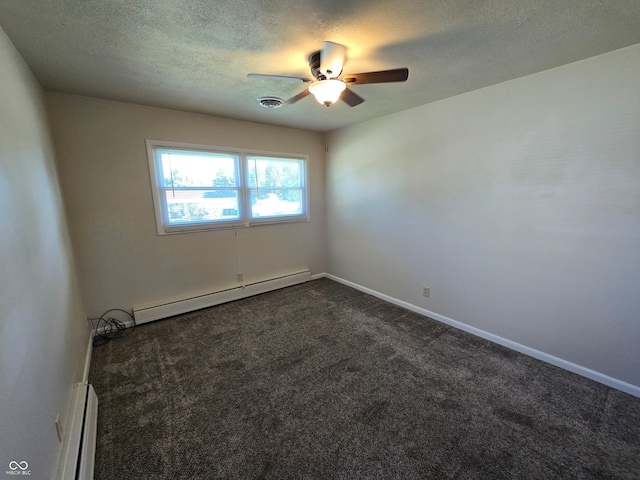 spare room with ceiling fan, a textured ceiling, dark colored carpet, and a baseboard radiator