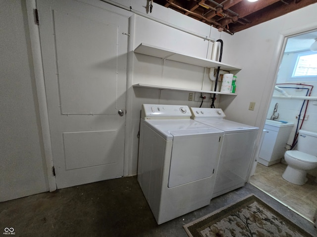 washroom featuring separate washer and dryer