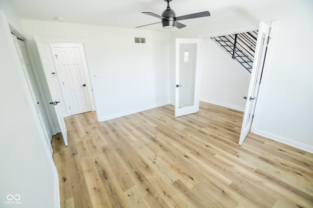 interior space with ceiling fan and light wood-type flooring