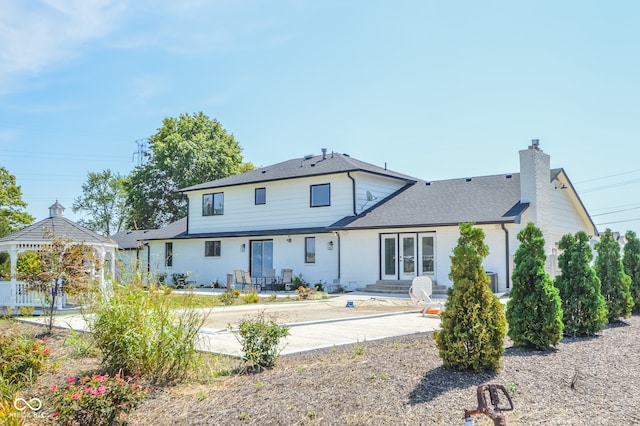 back of house with a patio area