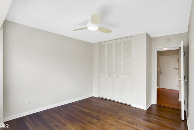 unfurnished bedroom featuring a closet, ceiling fan, and wood-type flooring