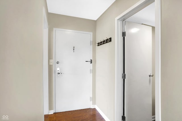 doorway with wood-type flooring